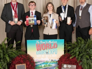 The NYS 4-H Dairy Judging Team poses with their awards at the World Dairy Expo (Left to Right: Hayden Ayers, Dayne Jantzi, Olivia Shawley, Larsen Swan, Coach Doug Waterman)