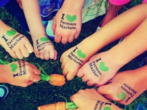 Kids hands stamped with "I Love Farmers Markets" submitted by S.Avery