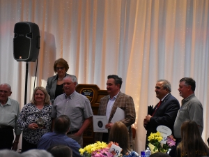 Dave Zilker, President of Ag Board; Conservation Farm of the Year Awardees Dawn and Mike Durow of Durow Farms; George Borrello, NYS Senator; Joe Giglio, NYS Assemblyman; Brian Davis; Crystal Abers in back