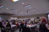 People eating at the 2018 Farmer-Neighbor Dinner at the West Valley Fire Hall