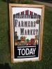 Breadboard sign with "Southern Tier Farmers' Market Today"